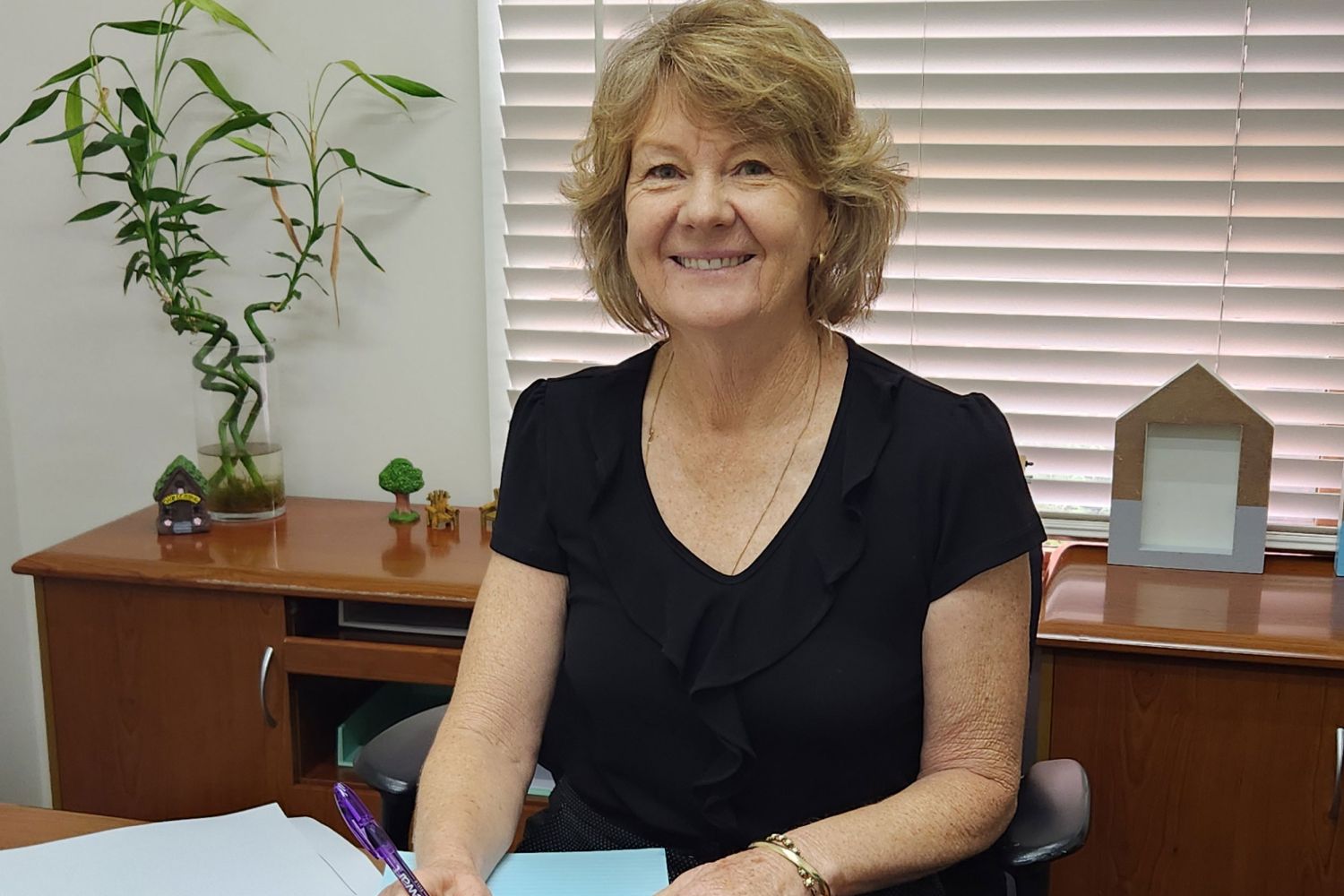 Christine Jones at her desk